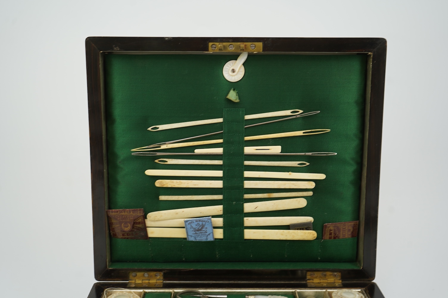 A mid 19th century rosewood writing and sewing box